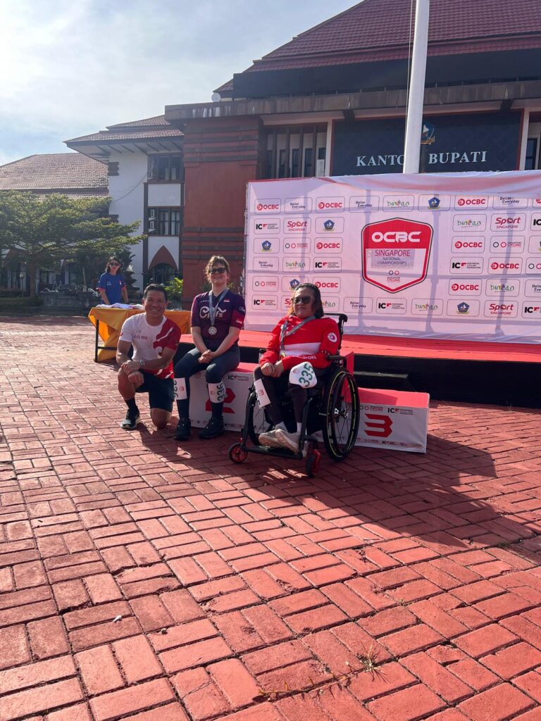 Handcycle Prize Ceremony Group Photo Abigail & Amanda Mok